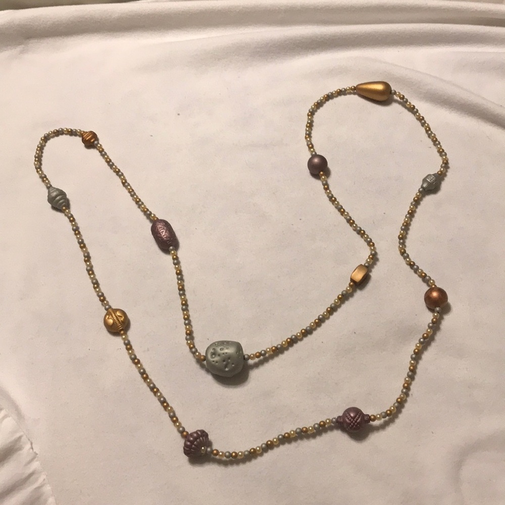 Ultra long beaded necklace.